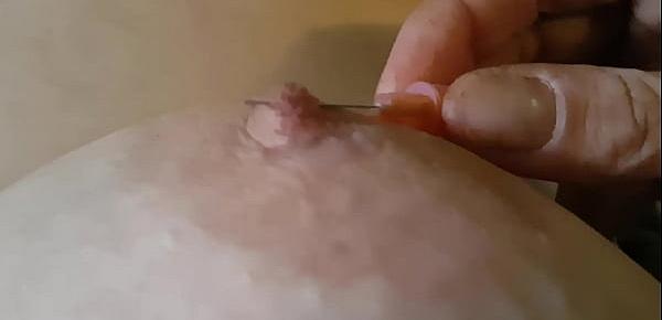  Pushing a needle through my nipple